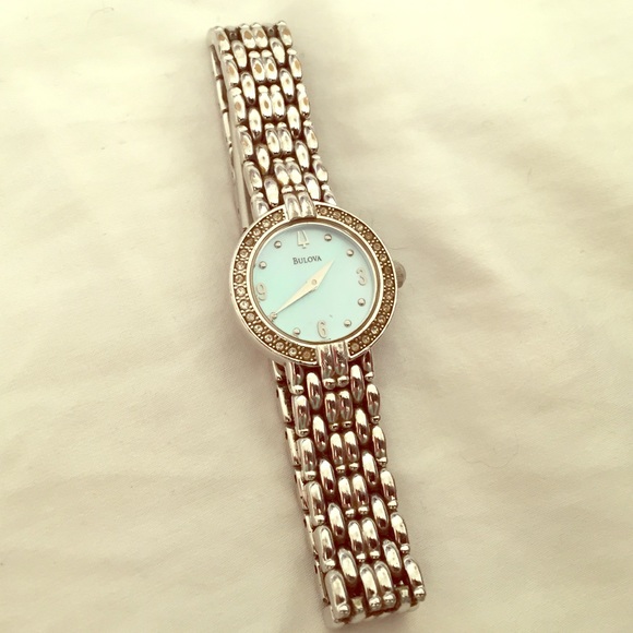 Bulova Accessories - Bulova women’s watch with diamonds around face